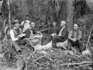 Group in Okahu Bush, near Kaitaia, taking a break from felling trees