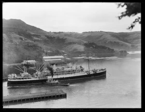 Steam ship Rangitata, with tugboat in Port Chalmers harbour