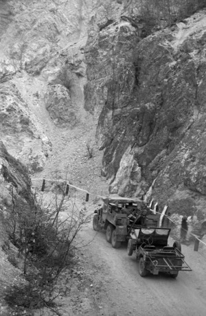 Military truck towing a jeep on the the Inferno Track, Cassino area, Italy