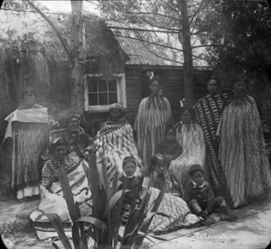 Maori group wearing cloaks