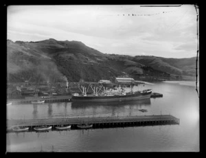 View of an unidentified ship (possibly one of the fleet of the Federal Steam Navigation Co.) berthed at the wharf in Port Chalmers