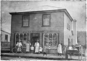 Group standing outside J A Hazelwood's general store, Main Street, Upper Hutt