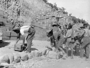 Indian troops, and others, next to stacks of boxes at No 4 supply depo, Gallipoli