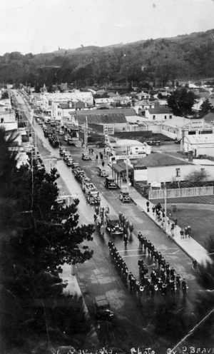 Looking down over Main Street, Upper Hutt, showing the funeral procession of Mayor Peter Robertson