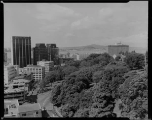 Auckland, featuring the west side of Albert Park, Kitchener Street, and city buildings including Nagel House, National Mutual, and the Hyatt Hotel in background
