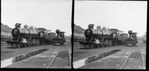 Q class steam train locomotive, unidentified railway yards