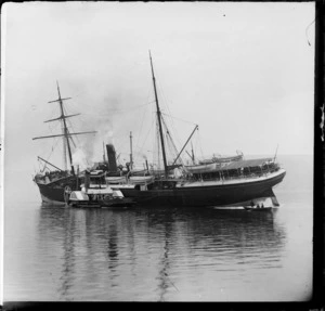 Ship 'Waihora' with tug boat 'Koputai' alongside