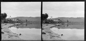 Boats and cottage at unidentified bay [lake? coastal?], Catlins area, Clutha District, Otago Region