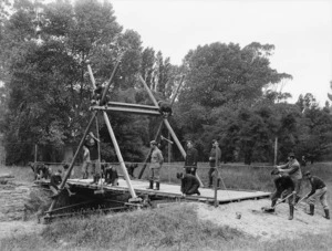 Voluntary members of the New Zealand Army Canterbury Engineers constructing a bridge