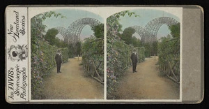 Joseph Divis on path in formal gardens with archways / Joseph Divis with older couple in forest setting