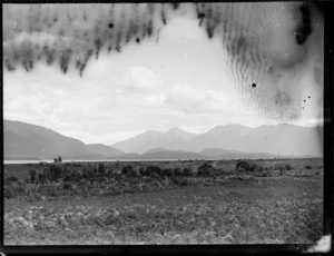 Lake and mountain range, location unknown