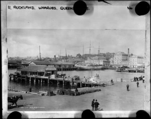 Queens Wharf, Auckland, featuring Coastal Steam Ship Company terminal and with central city in background - Photograph taken by Muir and Moodie, Dunedin