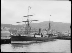 Ship 'Wanaka' at wharf with Wellington Post Office in background