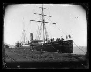 Steamer Waihora at Port Chalmers with 10 crew members standing in the bows