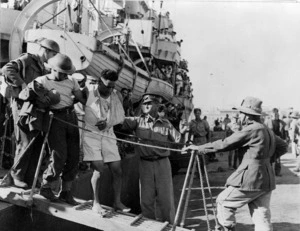 Injured World War II soldier disembarking off a ship in Alexandria, Egypt, after the campaign in Crete
