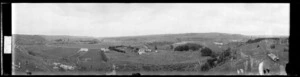 [Farm and house in valley. River and steep hills.]