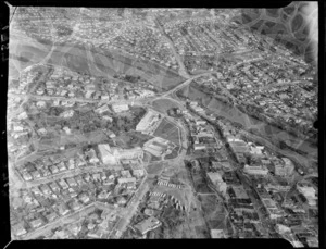 Aerial view of Lower Hutt commercial area, including the War Memorial Library building, St James Church, Town Hall and Administration building and the Hutt Recreation ground with grandstand