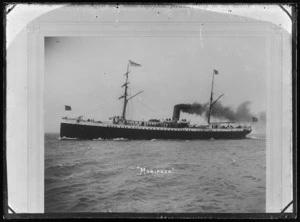 Steamship 'Mariposa' in the open sea with smoke billowing from her funnel