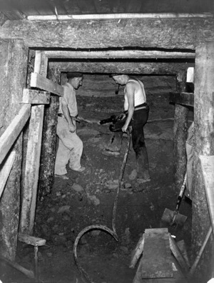 Tunnellers excavating one of the air raid shelters in the Hobson Street gully, Wellington