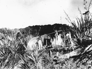Harper, Arthur Paul, 1865-1955 : Charles Edward Douglas alongside a maimai, on the Wanganui River, West Coast Region