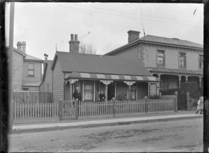 Charles and Mary Ann Godber outside their house at 73 Abel Smith Street, Wellington