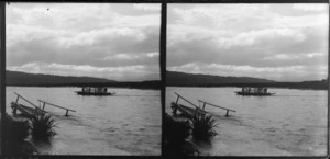 Waiau river, Southland, including a collapsed jetty and men transporting a horse on a barge