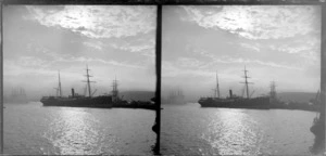 Unidentified ships moored at Dunedin wharf, including fog and stippled clouds