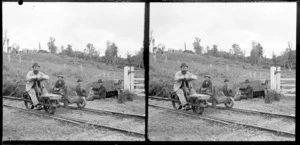 Four unidentified men [railway workers?] on smoko break, including jigger, location unknown