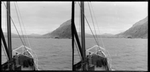 Kingston, seen from boat on Lake Wakatipu, Queenstown-Lakes District, Otago Region, including unidentified men on boat