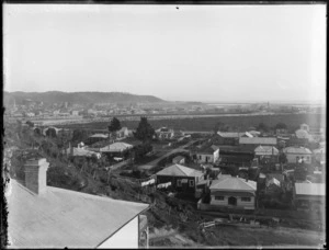 Greymouth, showing houses in the settlement of Cobden in the foreground, Grey River and commercial and civic buildings in background
