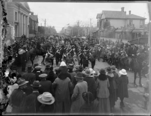 Peace celebrations in Christchurch after World War I featuring a band leading a military parade