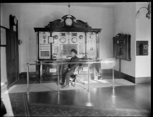 Christchurch Fire Brigade, fire fighter sitting at the control panel