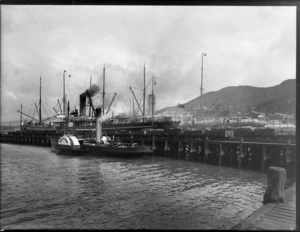 Ships and a steam paddle boat docked at Lyttelton Port, Christchurch