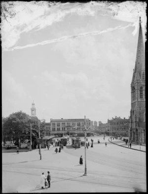 Cathedral Square, Christchurch, with people and trams at the tram shelter
