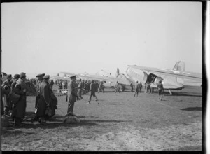 Liberated Allied prisoners of war waiting to board Dakota transport planes - Photograph taken by Lee Hill