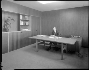 Unidentified man in the office of Ralta Ltd, Wellington