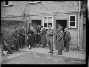Allied prisoners of war bartering for food - Photograph taken by Lee Hill