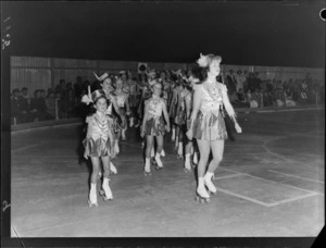 Marching girls on rollerskates, on an indoor skating rink, Lower Hutt