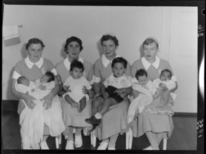 Unidentified toddlers and babies held by unidentified Karitane Hospital nurses