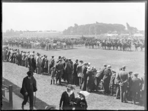 Crowd at the Canterbury Agricultural and Pastoral Association's Metropolitan Show, Christchurch, showing a line-up of horses and carriages