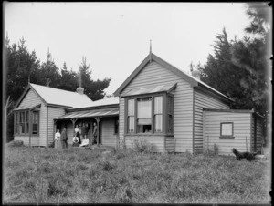 Homestead, showing group on verandah, possibly Christchurch area