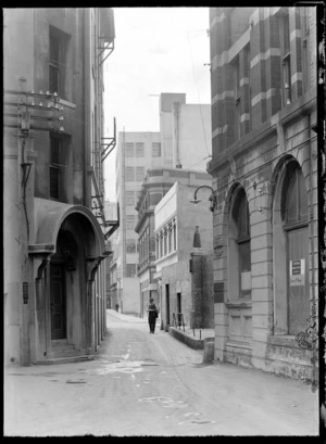Bond Street, Wellington, showing man walking through narrow street