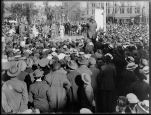 Crowds gather to watch a boxing match in Cathedral Square, Christchurch