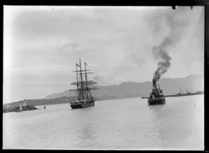 Lyttelton Harbour, Christchurch, showing an unidentified sailing ship and steam ship in the harbour, with crowd watching from the point, by lighthouse