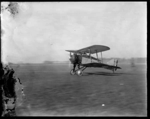 Biplane aircraft ready for take off at an unidentified location