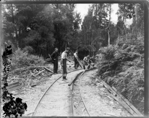Railway construction workers working on tracks