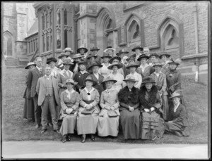 A group portrait of women and men outside the front of the Canterbury Provincial Council buildings, Christchurch