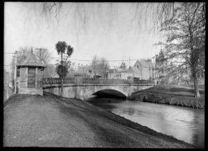 The stone bridge at Armagh Street, Christchurch, across the Avon River, featuring the Provincial and Supreme Court buildings in the background