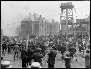 Crowds of people gather to watch the fire at Christchurch Public Hospital