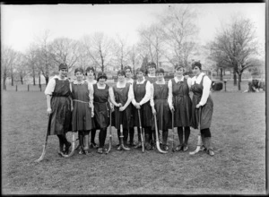 Women's hockey team in uniform and with sticks, possibly Christchurch region